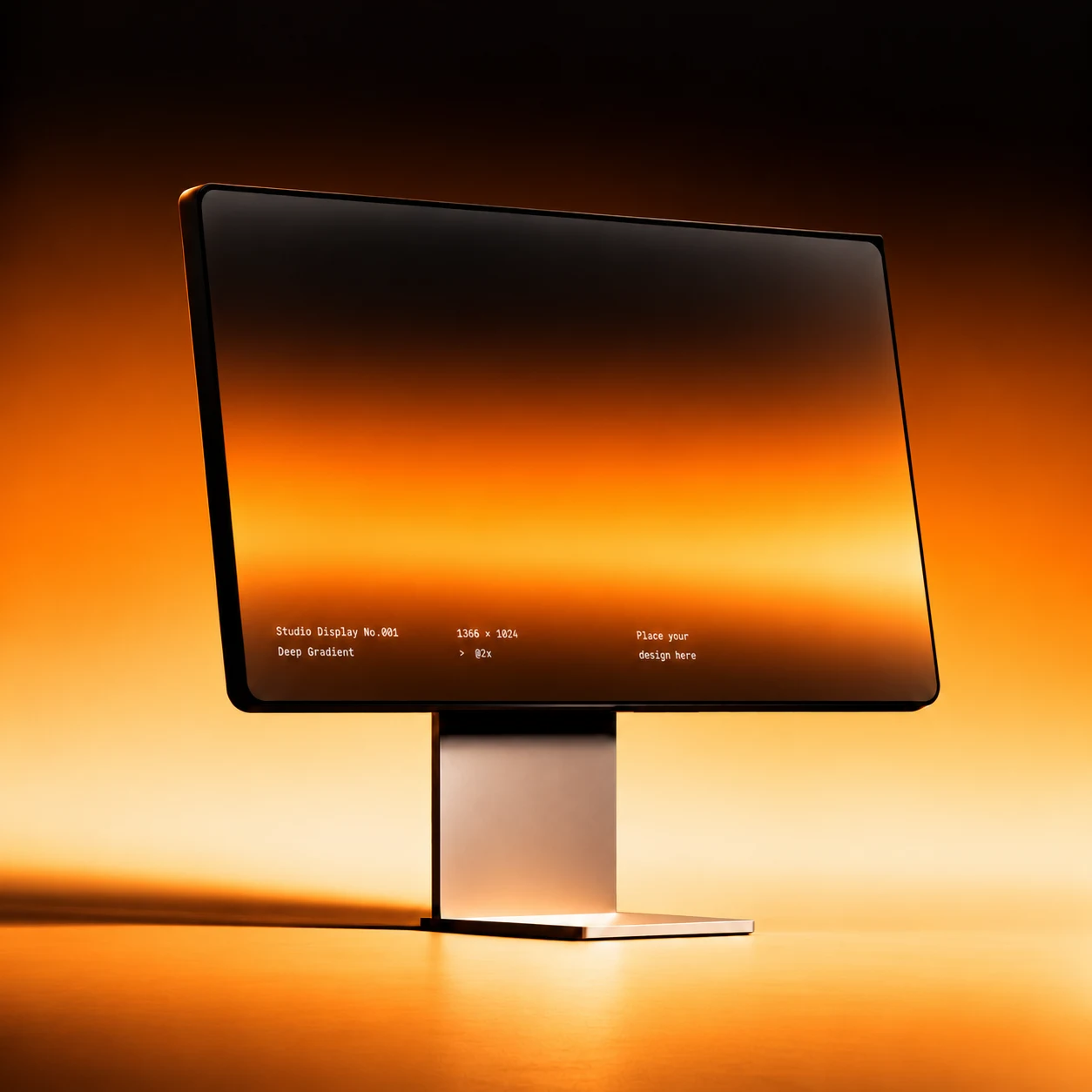 Studio display illuminated by an orange horizon
